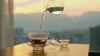 video of chinese gongfu tea making process against a scenic background